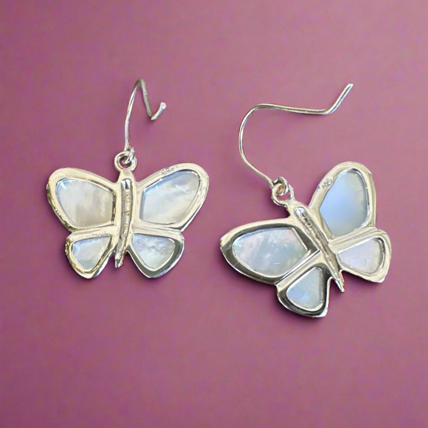 Earrings mother of Pearl .925 sterling silver butterfly dangle earrings.