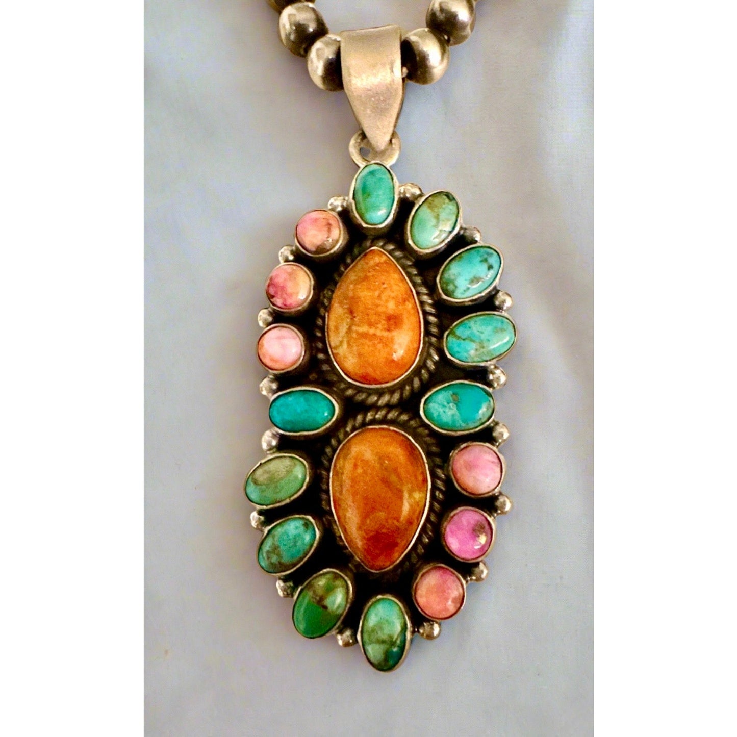 Blue turquoise orange spiny oyster pink Dahlia pendant 2.25”