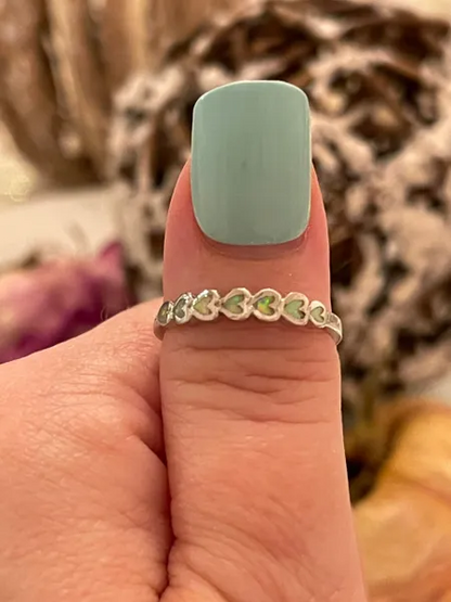 Sideways hearts eternity band lab created white opal band 925 solid sterling silver ring.