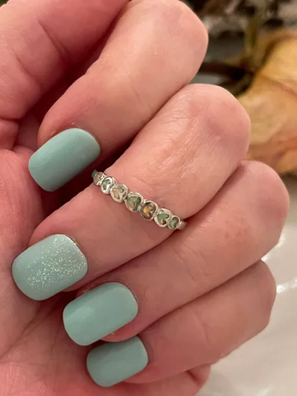 Sideways hearts eternity band lab created white opal band 925 solid sterling silver ring.